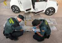 La Guardia Civil intercepta en Sagunto más de 16 kilogramos de marihuana en uno de los vehículos de un camión portacoches