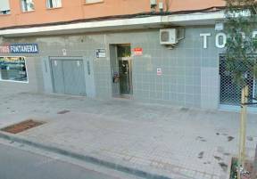 Portal de la calle Alcalá Galiano donde residía la mujer asesinada