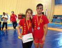 Marta Ojeda y Raúl Gallur con sus respectivas medallas